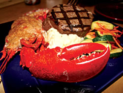 The revamped Roast House Surf and Turf special is available on the newly added seafood menu. The dish will stimulate all your senses. The Roast House offers fresh American cuisine and lively entertainment. Their 1400 square-foot patio is host to Ciga