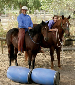 Paco and Norma Vela with horses Lefty and Gordon