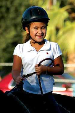 Carousel Ranch rider Kate Whelan is photographed here by association member Lisa Ahrens. Carousel Ranch will benefit from the group