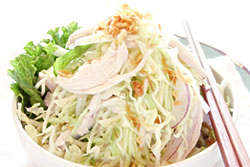 Resolve to eat healthier with this delicious Chicken Cabbage salad! Includes strips of chicken, herbs, shredded cabbage and red onion that