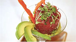 Fans of fish will rejoice after tasting the delicious Ahi Tuna Tartar complete with creamy avocado mousse and crisp tortillas. Enjoy this fresh dish while checking out Vines new decor and other delectable menu additions. <strong>Vines Restaurant and