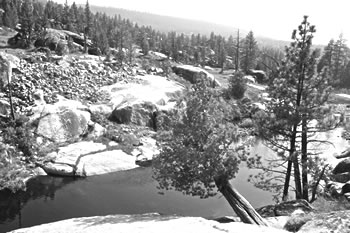 The winding, single-lane road from Huntington Lake to Edison Lake is well worth the drive to see spectacular High Sierra vistas, such as the flowing San Joaquin River