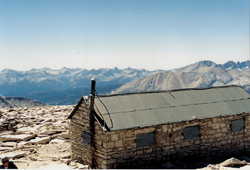 A stone hut built by the Smithsonian in the early 1900s awaits visitors at the summit of Mt. Whitney, the highest mountain in the continental United States.