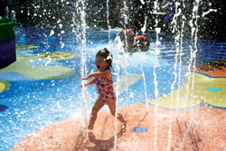 Brooke, 2, enjoys Swabbles Deck, an interactive water play area at <br>Legoland California.