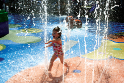 Brooke, 2, enjoys Swabbles Deck, an interactive water play area at Legoland California.