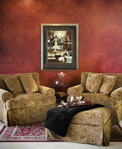 Adjacent to the bar is the "lounge," which features a deeply-shaded red wall - achieved by a local artist after seven careful applications of various paints. The decorative rugs found throughout the home were selected from Brent