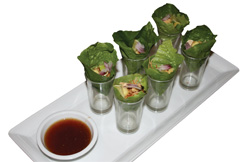 The <b>Miang Kum salad</b> will knock your socks off! Individual shot glasses include a small lettuce leaf filled with toasted shredded coconut, chopped peanuts, red onion and ginger with a side of sweet and sour dressing. Experience Thai cuisine tha