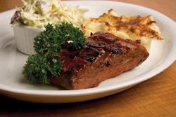 Delight your senses with mouth-watering <b>Tri-Tip</b>. The two-step cooking process results in tender, delicious barbecue fare that tastes like a dream, especially when paired with Rattler