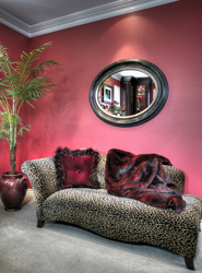 Chaise, throw, pillow and mirror selected from La Via Bella.