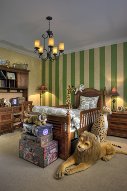 Dante Carr, 2, adores his Safari-themed bedroom - especially his "stuffed" wrestling partners.