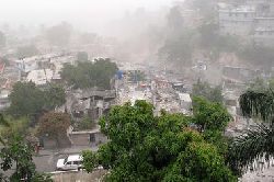 Buildings are seen damaged in the neighborhood of Petionville, Port-Au-Prince shortly after an earthquake hit Haiti Tuesday evening.