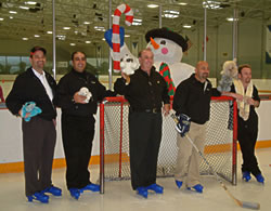 Gary Pilikyan, Kevin Oliff, Bob Smith and Jack Sinanian, all with the Power Automotive Group, get ready for a day on the ice. The company will host a free party, including ice skating, bumper cars, and more, at the Ice Station in Valencia.