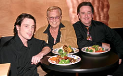 Dick Lee (center) with sons Beau (left) and Mike (right). The family has received great response for their new restaurant, the Roast House.