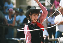 Street entertainers, like trick roper Karen Quest, engage guests in Western history. Photo by Ira Gostin of Gostin Productions.