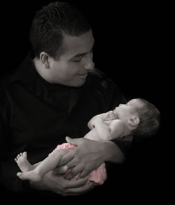 New dad Greg Corralejo with his daughter, Camryn.