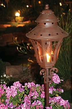 When it comes to nighttime get-togethers, illuminated walkways are both safer and more eye-appealing. This standing lantern is available at Orchid Gift Emporium.