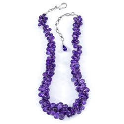 Purple is associated with royalty for a reason. This gorgeous amethyst briolette stone is featured in a handcrafted necklace, finished with a sterling silver adjustable chain and custom hook closure.<BR><em><strong>Bianca Jewel<BR>888-BIANCA-3</stron