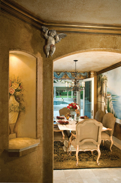 The formal dining room is home to a full-size mural depicting a scenic Italian scape.