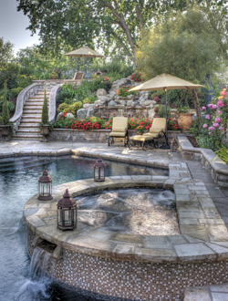 After two years of construction, the Hubbards have earned a relaxing lantern-lighted evening soak in the hot tub.