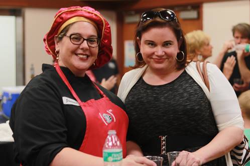 SCV Senior Center Executive Chef Joanna Valleluga and Erika Dapkewicz take a moment to enjoy the event festivities; Valleluga was responsible for the evening