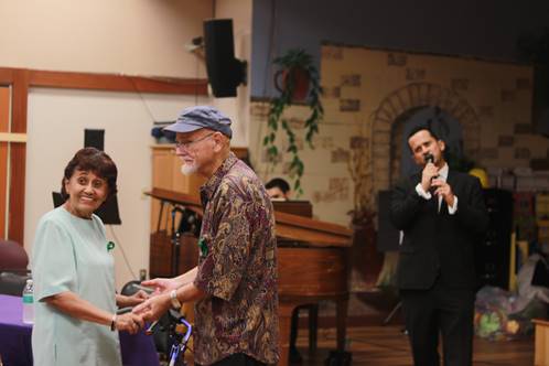 Ruth Castellano and Jerry Gray took to the dance floor at the New Building Party while professional crooner Adam Tunney sang hits from the Great American Songbook.